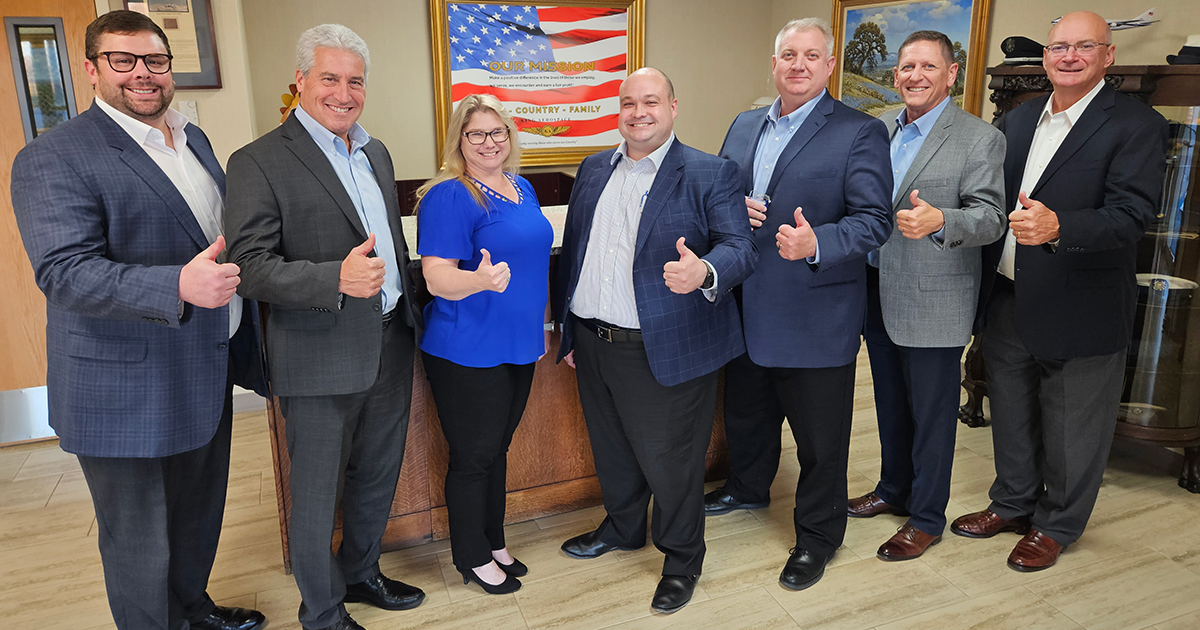 Left to right: Jarid King, Pete Schneider, Sally O’Connor, Cody Vanderslice, Bob Blanchard, Keith Weaver, Jerry Dunmire, at the new KA-ARK facility.)